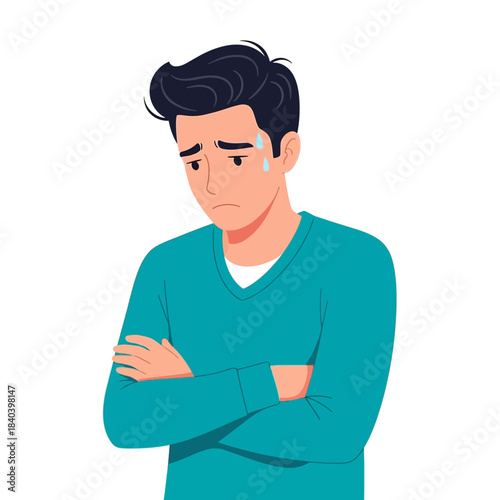 Upset young man with dark hair wearing a teal sweater, arms crossed, sweating, looking down with a worried or sad expression