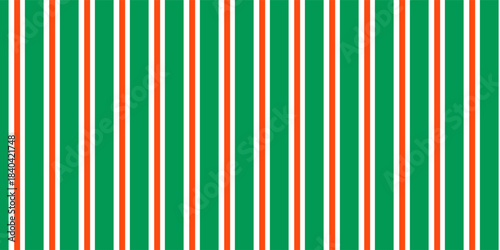 Christmas seamless pattern. Red and green diagonal stripes background. Candy cane repeating decoration wallpaper. Winter holiday lines backdrop. vector