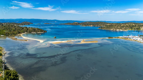 Aerial drone view of Fteroti Beach, sandbanks and lagoon in Sithonia, Chalkidiki, Greece