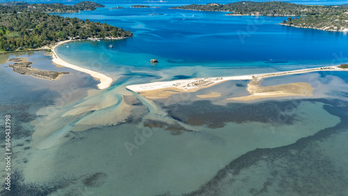 Aerial drone view of Fteroti Beach, sandbanks and lagoon in Sithonia, Chalkidiki, Greece