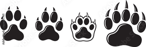 Four black animal paw prints displaying varying sizes and detail