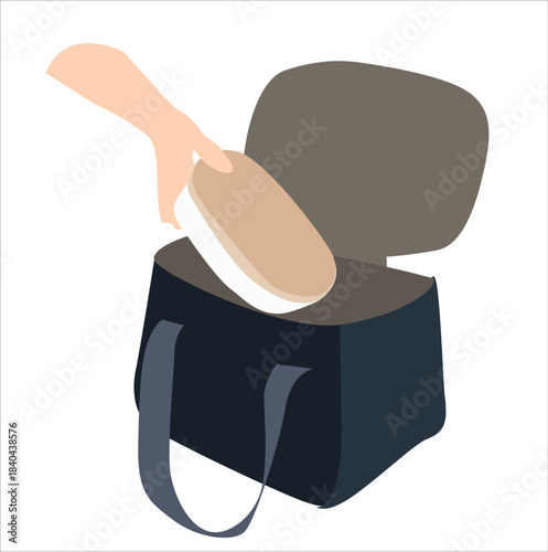 hand putting lunch box into bag