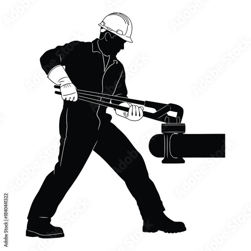 Plumber or worker using large pipe wrench on a pipe fitting