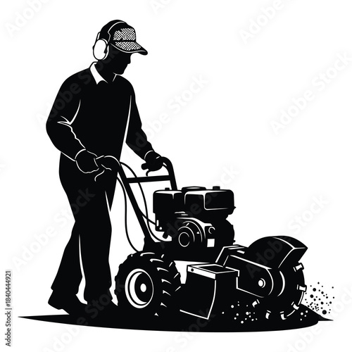 Man using a tiller isolated on to cultivate soil