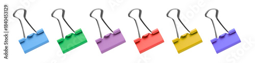 Photos Collection of colorful binder clips in a row on a white background, concept abou