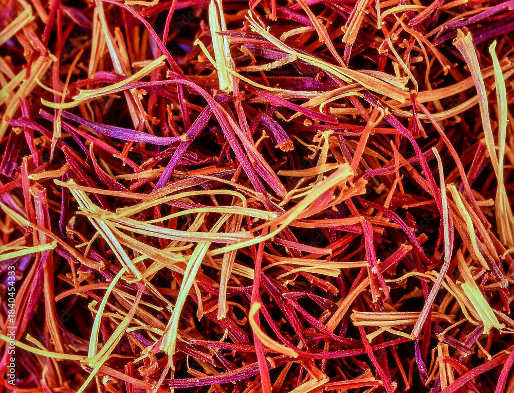 Fototapeta premium Close up saffron threads showing natural spice texture and organic luxury seasoning pattern