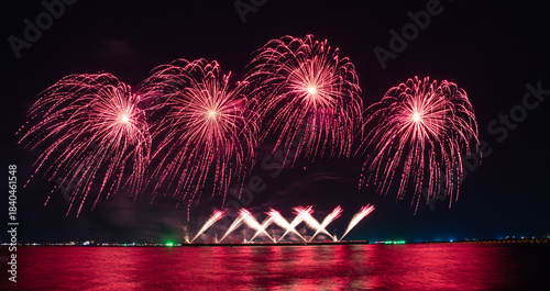 Wonderful fireworks display lights up the night sky, Amazing celebrating the joyous spirit of Christmas and New Year's 