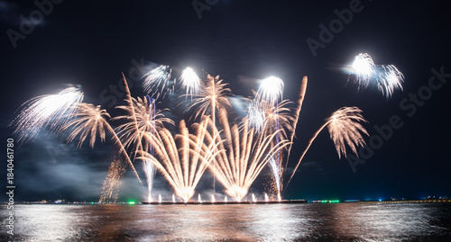 Wonderful fireworks display lights up the night sky, Amazing celebrating the joyous spirit of Christmas and New Year's 