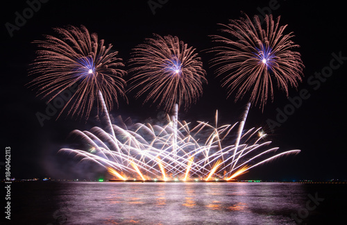 Wonderful fireworks display lights up the night sky, Amazing celebrating the joyous spirit of Christmas and New Year's 