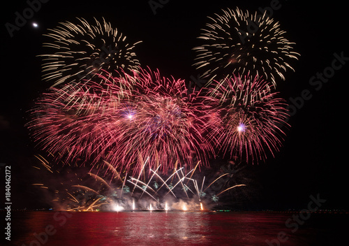 Wonderful fireworks display lights up the night sky, Amazing celebrating the joyous spirit of Christmas and New Year's 