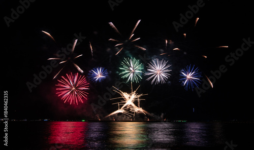 Wonderful fireworks display lights up the night sky, Amazing celebrating the joyous spirit of Christmas and New Year's 
