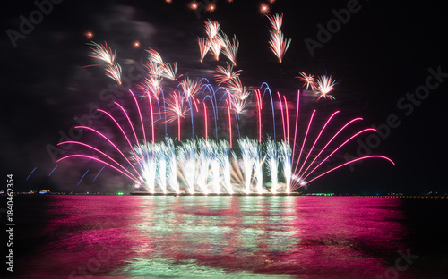 Wonderful fireworks display lights up the night sky, Amazing celebrating the joyous spirit of Christmas and New Year's 