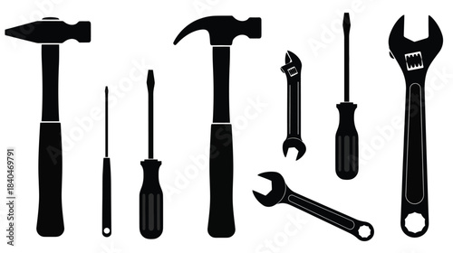 A collection of silhouetted hand tools including hammers screwdrivers and wrenches