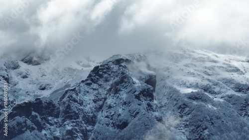 Aerial view cloudy sky over snow-capped Andes mountains in Coyhaique, Chile