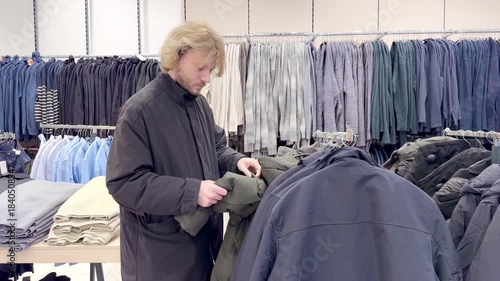 choosing clothes in a shopping mall. clothes hangers