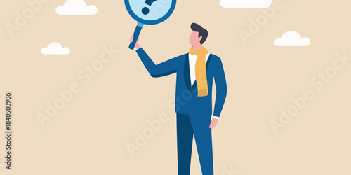 A man in a suit examining a magnifying glass with a question mark