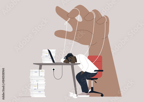 A person sits at a desk overwhelmed by towering stacks of papers, appearing defeated as a large hand pulls strings from above, showcasing the stress of manipulation at work