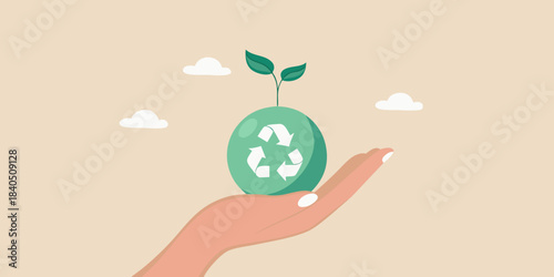 A hand cradling a seedling growing from a recycling symbol egg