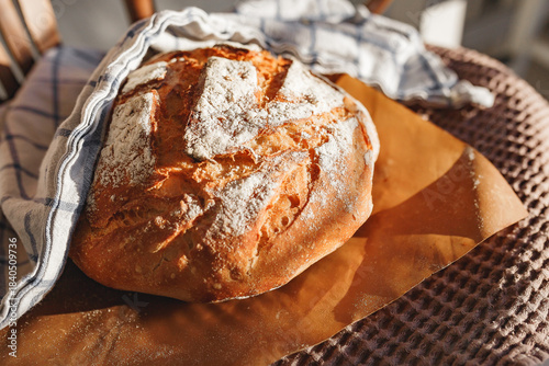 Freshly baked round bread with crusty texture