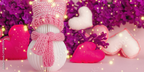 Cute greeting card for Valentine's or Mothers Day. Snowman with handmade hearts and lilac flowers