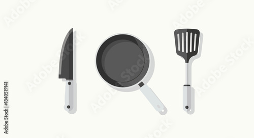 Kitchen Utensils - Knife, Frying Pan, and Slotted Spatula for Cooking.