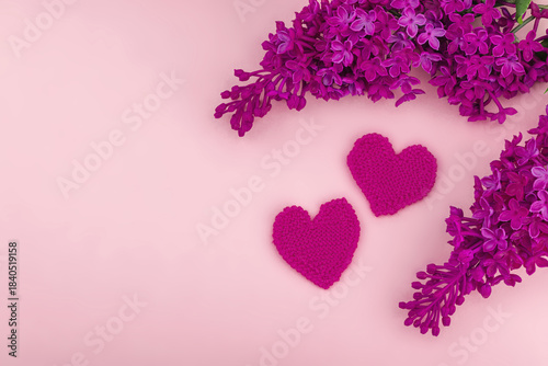 Handmade Valentines Day concept. Creative house figurines, traditional hearts, spring crocheting