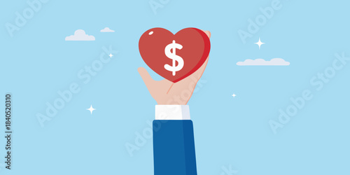 A hand holding a red heart with a dollar sign symbol inside