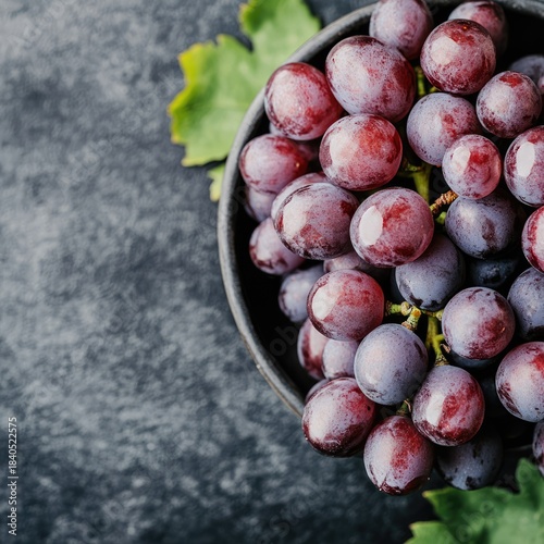 ripe blue grapes suggests abundance and sweetness, perfect for winemaking or enjoying fresh fruits