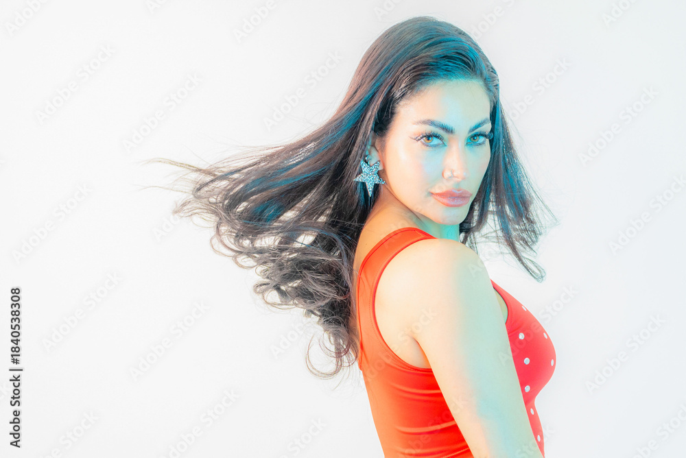 Fototapeta premium Beautiful female model posing in photo studio
