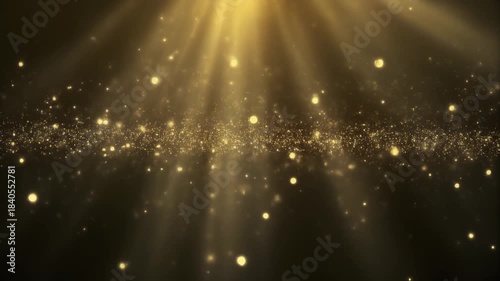 Ultra Slow Motion: Luminous Water Particles Rising, Catching Soft Golden Light Rays