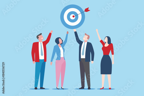 Team celebrating success with a target and dart hitting the bullseye