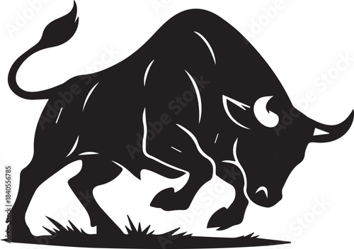 Black silhouette of a powerful charging bull with aggressive stance