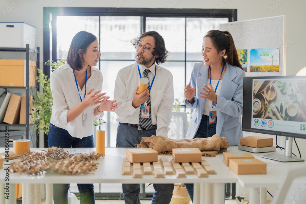 Fototapeta premium business team shares smart ideas and discusses new ways forward to develop innovative recycle, upcycle, and ESG packaging solutions, focusing on material reuse and green earth product usage 