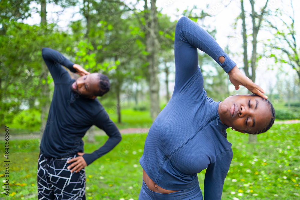 Fototapeta premium African couple exercise during the beautiful spring morning.