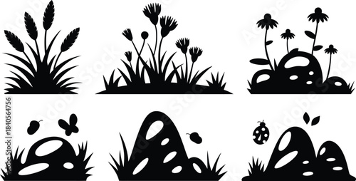 Black grass, wildflower, and stone silhouettes vector set