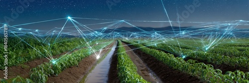 Smart agriculture technology at night with connected farming field under starry sky