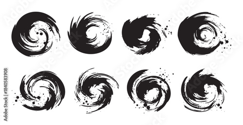 Abstract brushstroke circles with dynamic swirling ink textures create a versatile collection of graphic design elements for modern artistic projects.