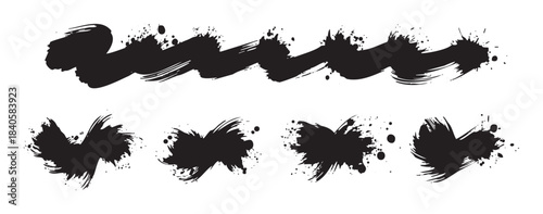 Black ink brush strokes and splatters create a dynamic collection of artistic elements with rough textures and expressive paint marks.