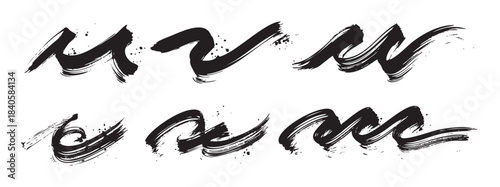 Abstract brush strokes create dynamic artistic wavy lines with a grunge texture and expressive ink splatters, perfect for creative design elements.