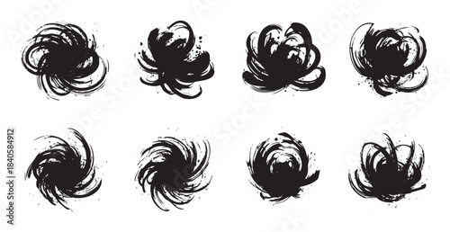 Abstract ink brush strokes set featuring various artistic grunge splatters and decorative elements, perfect for creative design projects and graphic overlays.