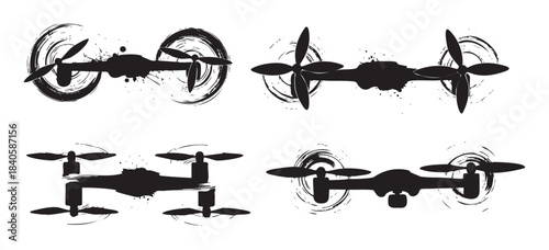 Four abstract grunge style drone silhouettes flying with dynamic brushstroke effects, representing modern technology, delivery, and aerial photography concepts.