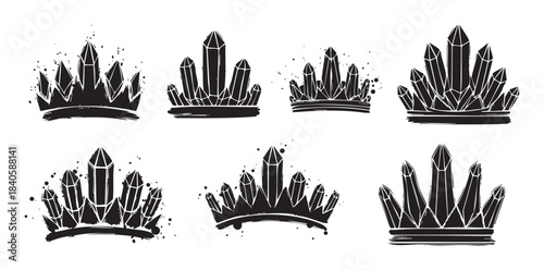 Collection of mystical crystal crowns with a grunge aesthetic, featuring rough brush strokes and scattered ink splatters, perfect for magical designs.