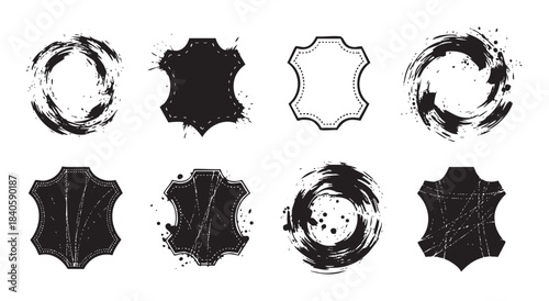 Abstract grunge brushstroke circles and stylized leather hide symbols create a versatile collection of distressed ink elements for design projects.
