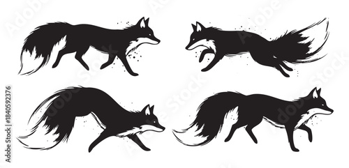 Four black fox silhouettes in various dynamic poses showcasing their agile movements and wild spirit with an artistic brushstroke style.