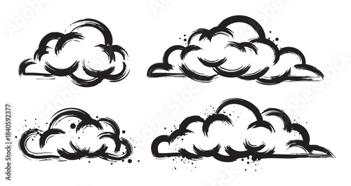 Hand drawn brushstroke ink clouds set with artistic texture and splatter details, perfect for graphic design elements and creative projects.