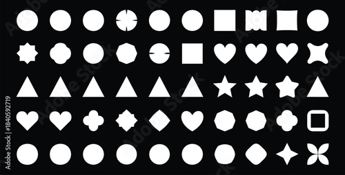 Collection of white geometric and abstract shapes displayed in neat rows against a solid black background