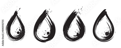 Four black ink brushstroke drops with artistic texture and splatters create a dynamic and expressive graphic element for design projects.