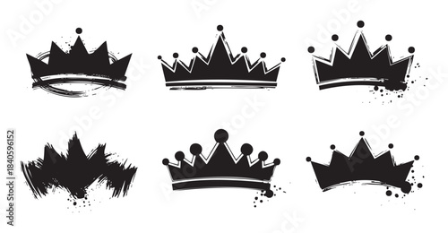 Six grunge style crown icons with various distressed textures and artistic brush strokes, symbolizing royalty, power, and achievement in a modern graphic design.