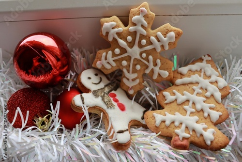 Homemade sweet gingerbread Christmas cookies decorated with icing and candy for the holiday dessert