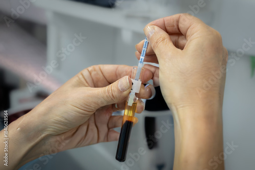 Preparing a Blood Sample Tube for Laboratory Testing